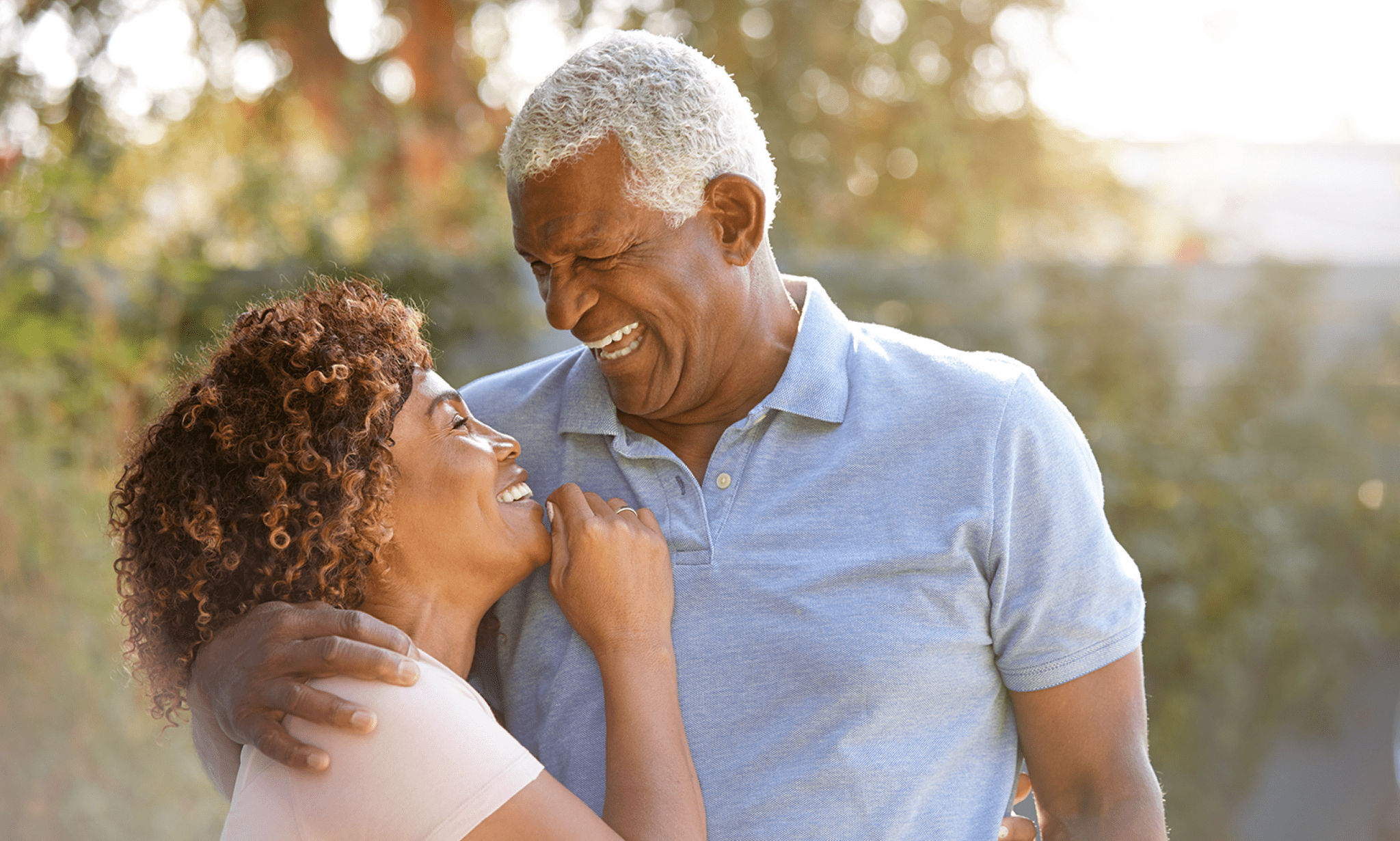 portrait-of-smiling-senior-african-american-couple-53JSG9Y-1 1